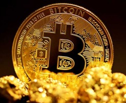 a bitcoin sitting on top of a pile of gold nuggets - A single bitcoin surrounded by raw gold pieces., tags: high - unsplash