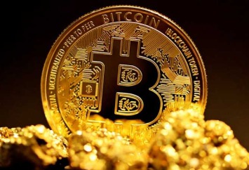 a bitcoin sitting on top of a pile of gold nuggets - A single bitcoin surrounded by raw gold pieces., tags: high - unsplash